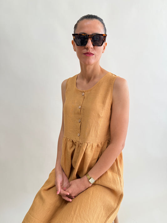 SLEEVELESS BUTTONED DRESS