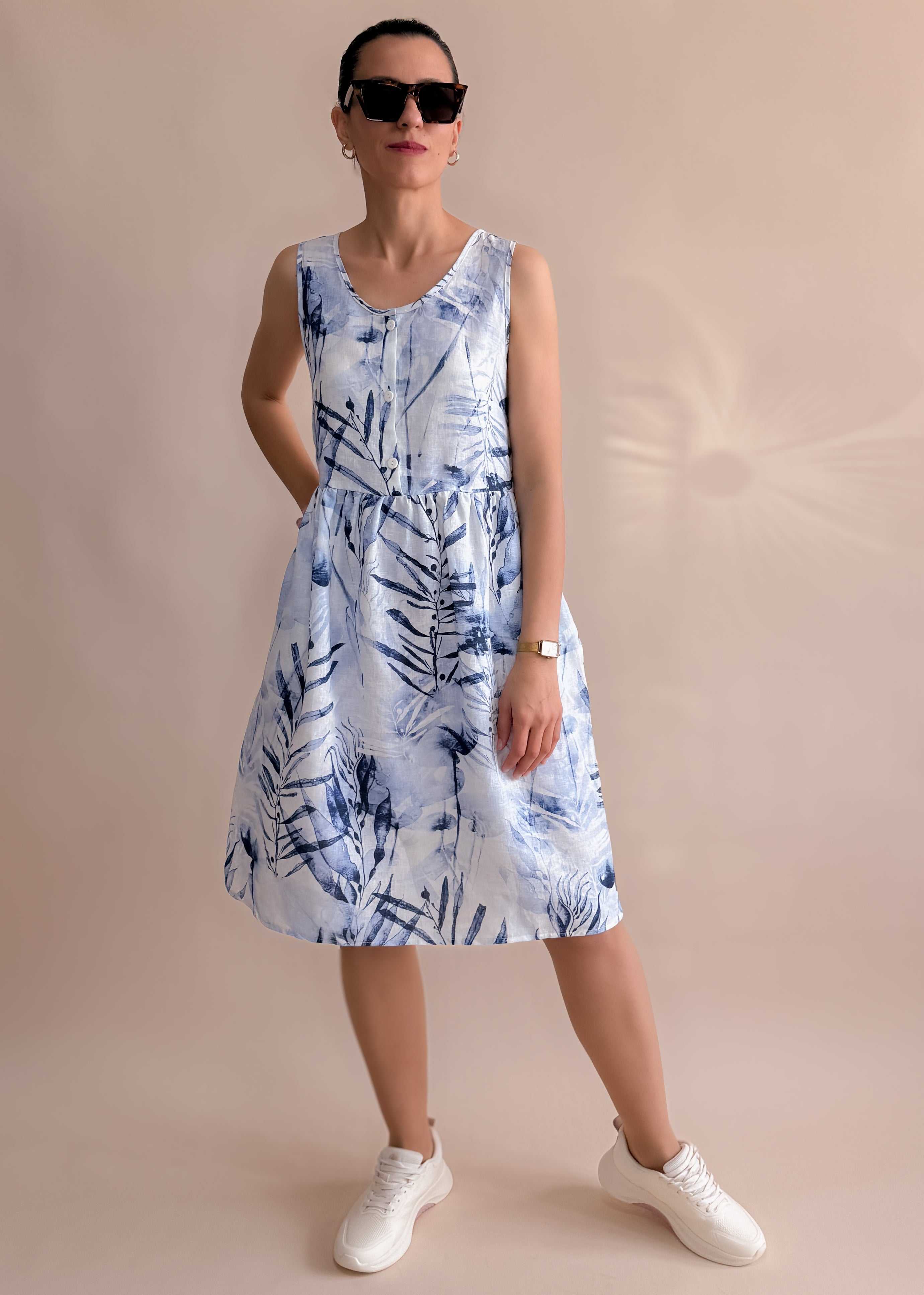 SLEEVELESS BUTTONED DRESS